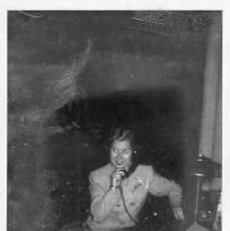 Irene Simpson (Neasham), answering a phone, ca 1950