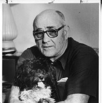 Robert Hohman, father of hostage Sgt. Don Hohman, with Tipper the dog, watches President Carter on TV. Sgt. Hohman, an army Medic, was from West Sacramento. Iranian Hostage Crisis