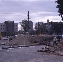 Views of redevelopment sites showing the demolition of buildings and reconstruction in the district. These views date from 1959 to 1964. Specific sites are not identified in this set of images