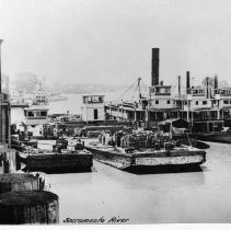 Steam boats and barges on the Sacramento River