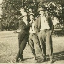 Three men posing