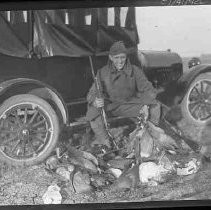 Man with animals and birds