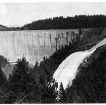 Water for the first time rushes down the spillway of the new 645-foot Bullards Bar Dam