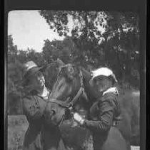 Two women and a horse