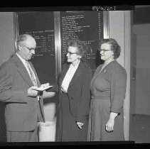 Two women and a man in a union office