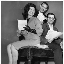 Wendy Douglas, Miss California of 1963 discusses with the leaders of the Miss Sacramento beauty pageant support for the contest from local patrons. In the center is Don Aston, pageant patron chair and on the right, Robert R. Means, pageant director