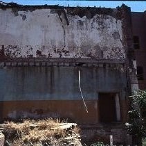 Old Sacramento. View of the west wall of Pioneer Hall before reconstruction