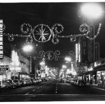 Street scene at night looking west