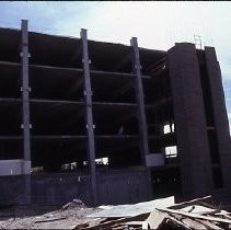 Site of the Downtown Plaza Parking Garage, Lot "G" near Macy's Department Store, 4th, 5th K and L Streets under construction. This view is looking east from the Fratt Building in Old Sacramento