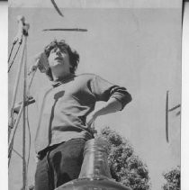 Tom Hayden (Thomas E. Hayden), antiwar and civil rights activist, at microphone