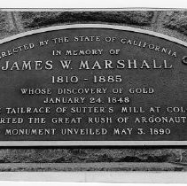 Photograph of the plaque on the James W. Marshall State Historic Monument in the Marshall State Historic Park