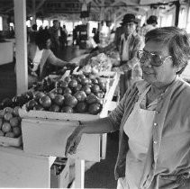 "Mrs. DeLeon at her Booth"