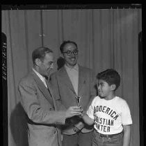 Boy receiving an award