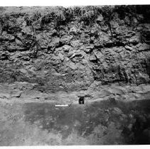 Drake's Bay. "Glass in sand strata, Possible Drake fort, Drakes Bay, California."