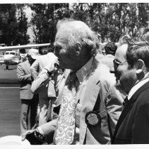 Ernest K. Gann, author, (on the right) addressed over 600 attendees at the Rotary Fly-In at the Nut Tree in Vacaville, California. On the left is Edwin Power, Jr. one of the owners of the Nut Tree