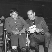 Bobo Olson and boy in wheelchair