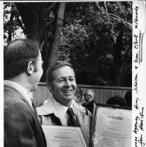 William Clark receiving California's highest award for heroism, the Medal of Valor. Presenting the award is Secretary of Resources Agency, Huey Johnson. Clark is California Department of Forestry fire crew supervisor who rescued five persons whose boat had capsized in heavy surf near Oceano February 2, 1977