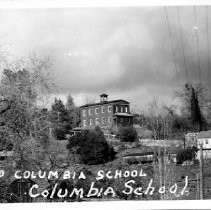 Old Columbia School postcard, long view with house to the right