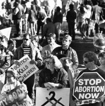 Pro-choice and anti-abortion demonstrators mingle