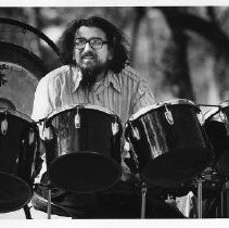 Stan Lunetta in the woods with his drum set