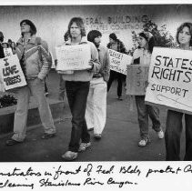 Demonstrators in front of the downtown Sacramento Federal Building protest the Army Corps of Engineers