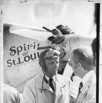 Verne Jobst, pilot and president of the International Aerobatics Club of America, is welcomed to the Capital City. He is standing in front of a duplicate of the Spirit of St. Louis