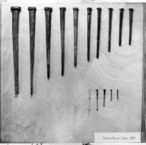 California State Capitol restoration project. Close-up view of artifacts found at the site. These square nails date to the original construction in the 1860s