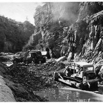 Heavy equipment is used to prepare Box Canyon for construction of the Box Canyon Dam