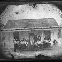 Men on a cabin porch