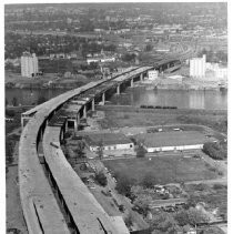 Aerial view of the partially-completed W-X Streets Bridge, Pioneer Bridge