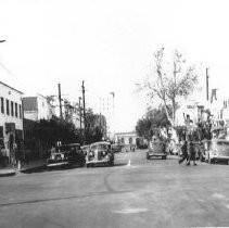 Japanese commercial district, looking north on 4th Street at M Street [Capital Mall]. Photograph taken May 10, 1942 (just before internment)