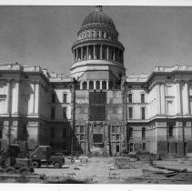 Exterior view of the California State Capitol undergoing the demolition of the apse or central section