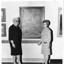 Irene Simpson Neasham with Ruth Maliovo in front of unknown painting