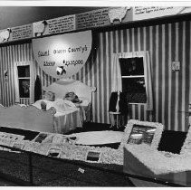 View of Glenn County's exhibit booth at the California State Fair. This was the last fair held at the old fair grounds