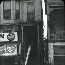 Views of redevelopment sites, renderings, and table models for the proposed Redevelopment District. Includes maps and site plans. This is a view of 1309 4th Street