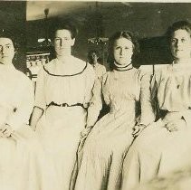 Four women sitting