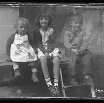 Three children sitting