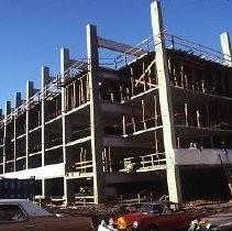 Site of the Downtown Plaza Parking Garage, Lot "G" near Macy's Department Store, 4th, 5th K and L Streets under construction. This view is looking east from the Fratt Building in Old Sacramento