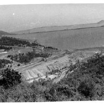 Wide view of the nearly-completed Oroville Dam and reservoir