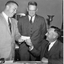 Three Men in an Office