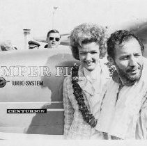 Dr. Alvin Marks, pilot and owner of Skymark Airlines. Here, with his wife Phoebe, standing in front of his plane