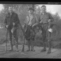 Three with dead game birds