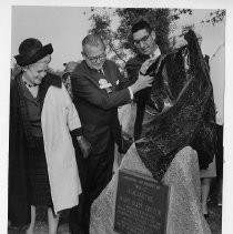 Carl Buchheister, president of the National Audubon Society (center), helps dedicate plaque on granite boulder in C.M. Goethe Park to memory of Goethe and wife Mary Glide Goethe