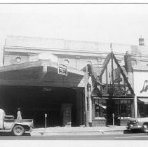 Exterior view of the building that was the Hippodrome Theatre where the marquee fell from the facade in 1946. It is being prepared to reopen as the Crest Theatre in 1949