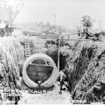 "First Joint of 9' Diameter Pipe in Trench"