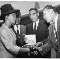 Wendy Douglas, Miss California of 1963 as she receives the key to the city from Sacramento officials