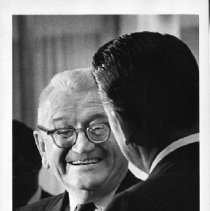 General Lewis B. Hershey (with Governor Ronald Reagan, back to camera). Hershey (U.S. Army) was the controversial head of the Selective Service System