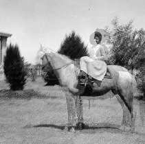 "Rider Girls on Horseback"