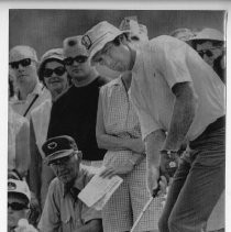Bob Lunn, pro golfer, chips from the rough at the ninth hole during the final round of the Charlotte Open