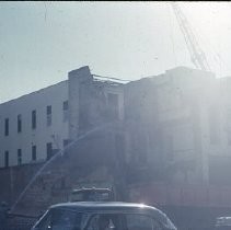 Views of redevelopment sites showing the demolition of buildings in the district. These views date from 1959 to 1964. Specific sites are not identified in this set of images